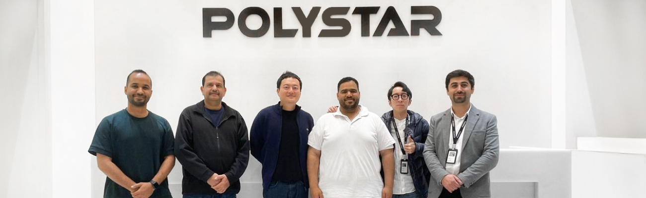 Image: six men standing in front of a POLYSTAR lettering; Copyright: POLYSTAR